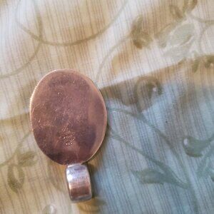 Sliver pendant with stone